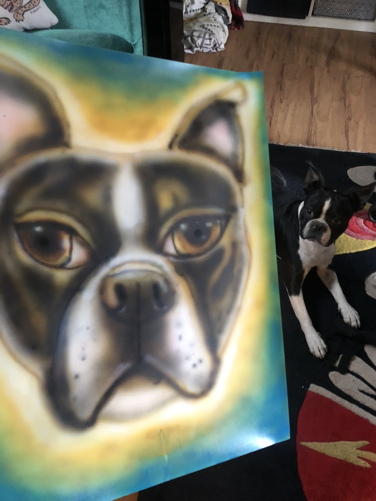 Heart framed portrait painting of a dog